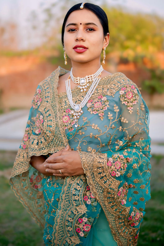 Elegant Teal Blue Hand-Embroidered Silk Saree with Floral Golden Zari Work